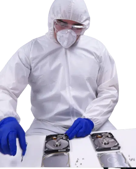 Payam Toloo in cleanroom suit swapping heads on 3.5" HDD at Payam.