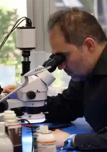 Payam Toloo using microscope for data recovery Australia