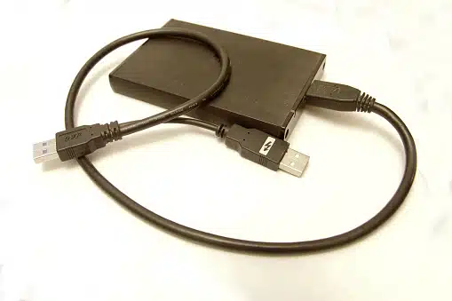 Technician recovering data from an external hard disk at Payam Data Recovery, Australia