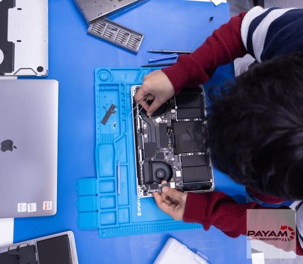 Payam Data Recovery technician repairing a logic board in Adelaide to recover critical data securely