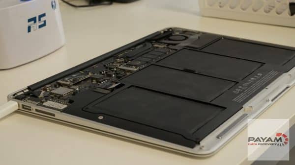 MacBook Pro power management IC case study showing component-level logic board repair
