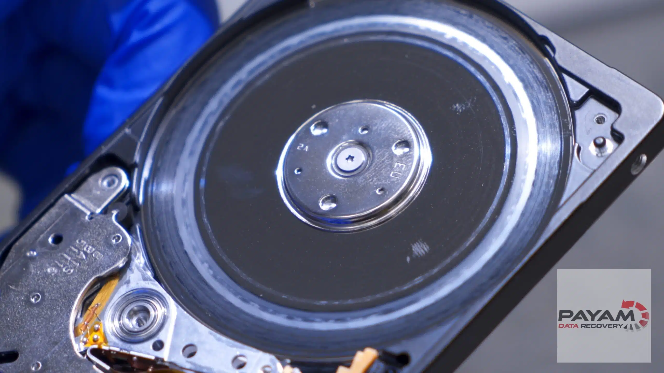 Scratched hard drive platter examined by Payam Data Recovery for expert data recovery in Brisbane.