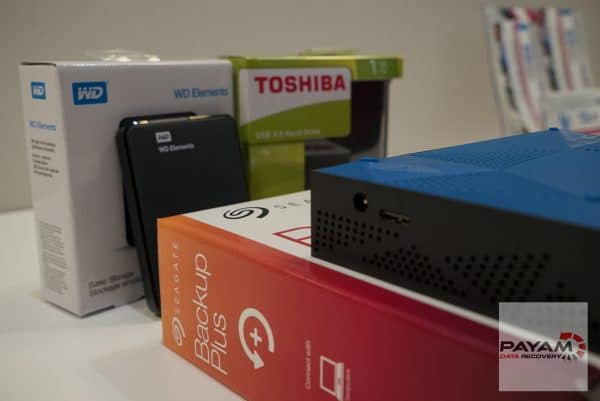 Three external hard drives used for hard drive data recovery by Payam Data Recovery in Sydney, ensuring expert data recovery services.