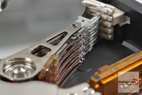 Damaged hard drive heads stack showing intricate parts for Payam Data Recovery’s hard drive data recovery in Sydney.