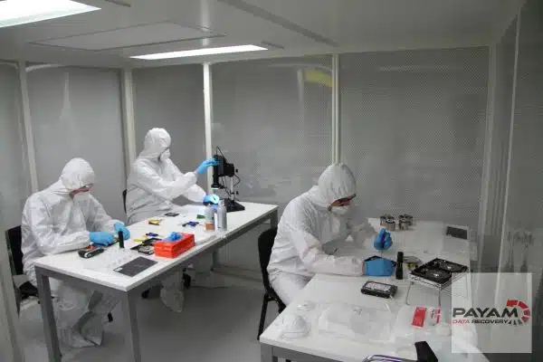 Payam Data Recovery engineers performing Toshiba hard drive data recovery inside a certified cleanroom at the Perth facility, highlighting our meticulous approach.