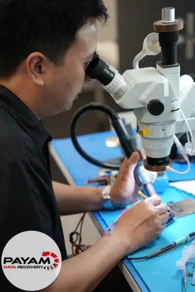 iPhone data recovery Brisbane - technician performing motherboard repair for boot loop recovery