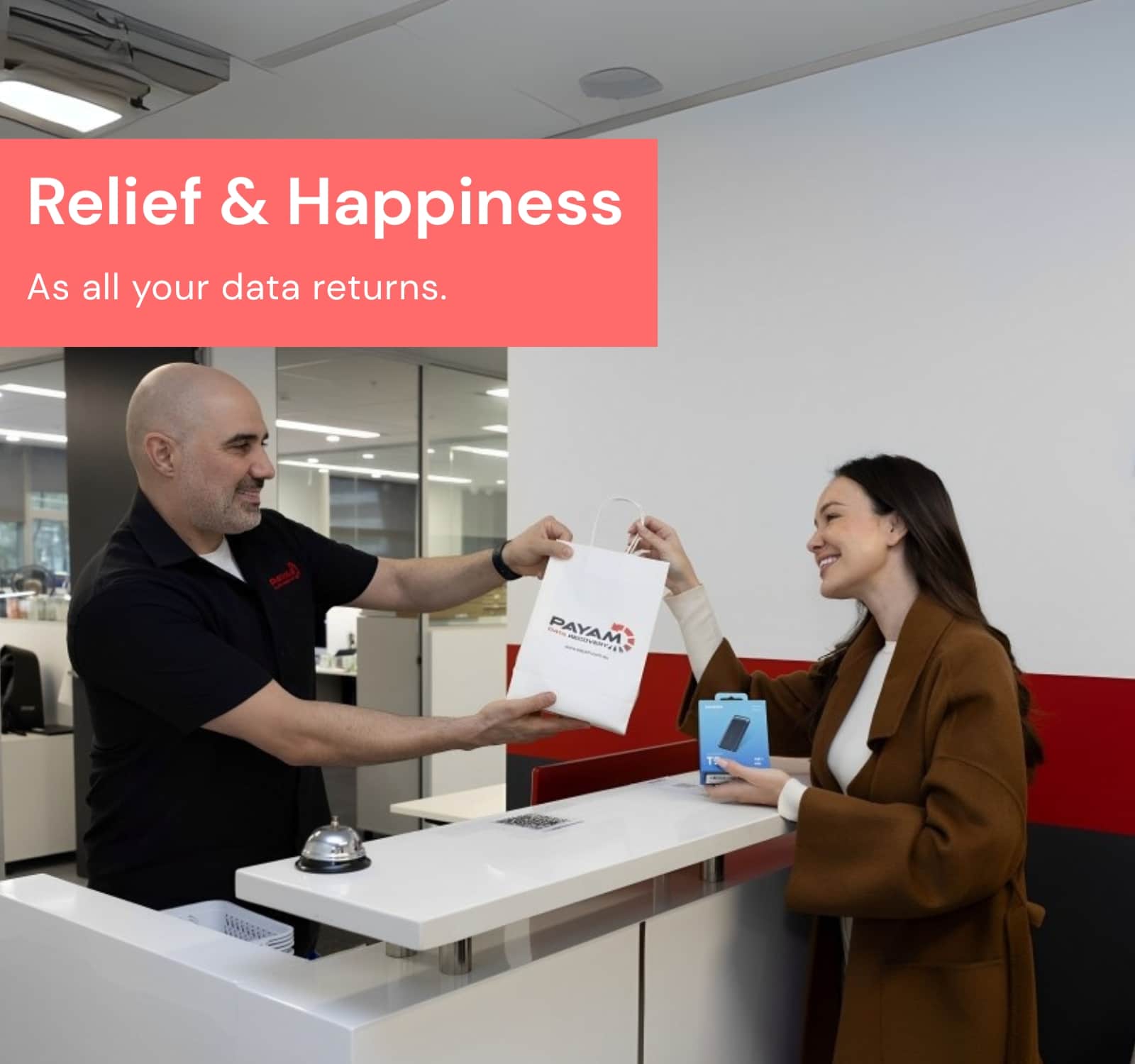 Smiling customer at Payam Data Recovery Sydney after successful recovery of important data from a damaged or failed device