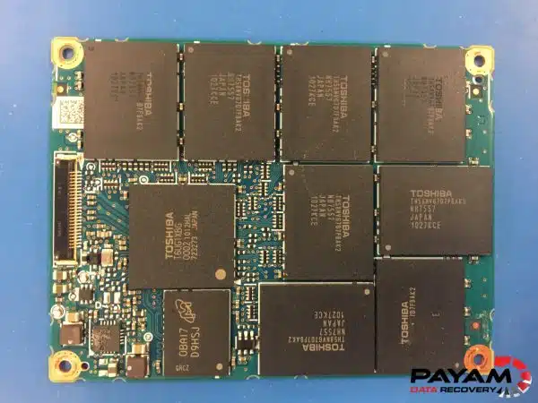 Dead SSD data extraction Sydney laboratory showing 2.5-inch drive with multiple NAND chips