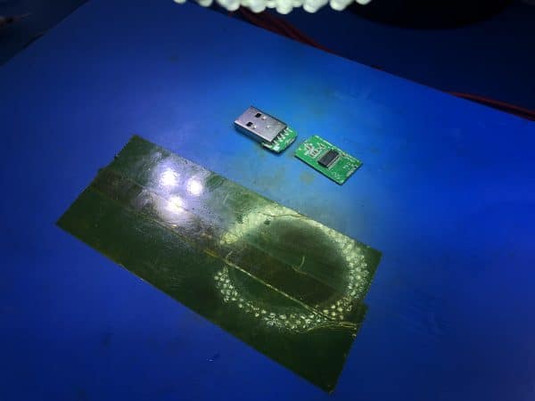 USB connector repair Perth case study: specialist soldering new connector to circuit board during data recovery process