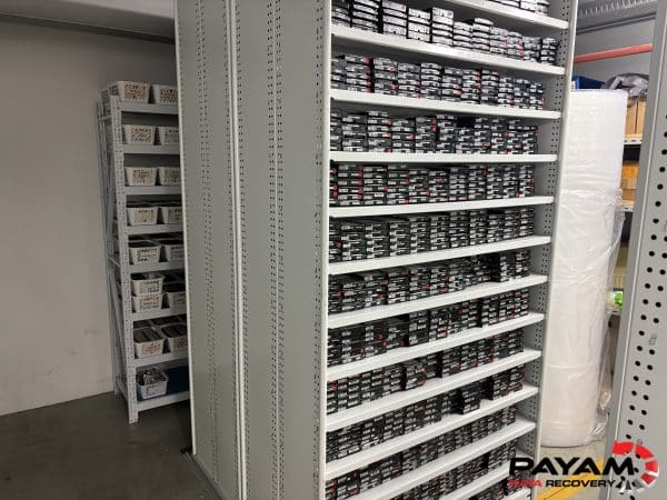 Shelf filled with donor hard drives at Payam Data Recovery lab in Australia.